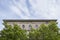 Beautiful treetops in spring against the background of an ancient building in Europe. Germany