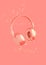 Beautiful trendy wireless headphones on coral pastel background 3D illustration