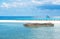 Beautiful Tropical beach Blue sea blue sky and white sand beach with beach chairs and parasol . Summer vacation