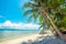 A beautiful tropical beach with palm trees at Koh Phangan island