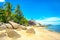 A beautiful tropical beach with palm trees at Koh Phangan island