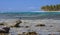 Beautiful tropical landscape: ocean, island, coast, palm trees.