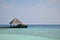 Beautiful tropical Maldives pier and island with beach and sea on sky for holiday vacation background, boat and ship departure, ar