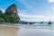 Beautiful tropical railay beach with Thai traditional wooden longtail boat