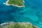 Beautiful tropical sea, Aerial drone shot of a small green island over the sea small island near the coast of Phuket Thailand.