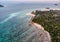 Beautiful tropical sea with coral reef at sunset