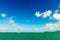 Beautiful tropical sea under the blue sky with green islands