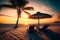 Beautiful tropical sunset scenery, two sun beds, loungers, umbrella under palm tree