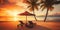 Beautiful tropical sunset scenery, two sun beds, loungers, umbrella under palm tree Generative AI technology