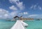 Beautiful tropical vibrant panorama of arrival jetty at the island resort
