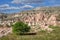 Beautiful Turkish landscape. The valleys of Cappadocia with red tuff mountains  fantastic valleys