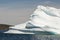 Beautiful turquoise colors underneath a massive iceberg off the coast of Newfoundland Canada.