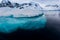 Beautiful turquoise ice below surface glacier in Antarctica