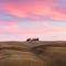 Beautiful Tuscany Landscape with hills and cypresses at sundown