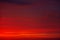 Beautiful Twilight sky background. Colorful Fiery orange and red sunset sky