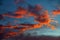 Beautiful Twilight sky background. Colorful Fiery orange and red sunset sky