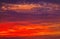 Beautiful Twilight sky background. Colorful Fiery orange and red sunset sky