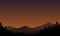 Beautiful twilight sky with a fantastic view of the mountains from the outskirts of the city with the silhouette of the