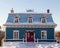 Beautiful two-chimneyed Second Empire turquoise house with metal sheet mansard roof