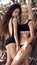 Beautiful two sexy bikini model in fashion swimwear posing on exotic beach. Summer vacation. Brunette and blonde. Alluring women