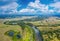 Beautiful Ukrainian nature background. Drone view on riverbank of the Seym river and amazing cloudscape over it. Summertime