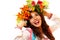 Beautiful ukrainian young woman in garland of summer flowers and