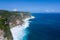 Beautiful uluwatu cliff with blue sea