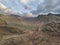 Beautiful unique drone aerial sunrise landscape image of Blea Tarn and Langdales Range in UK Lake District