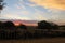 A beautiful unique half stormy sky cloud formation over a kraal