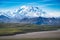 Beautiful unobstructed view of Mt Denali McKinley on a sunny summer day. Chemtrails in the photo