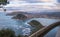 Beautiful upper aerial view on san sebastian coastline from mountain monte igueldo in colourful sunset sky