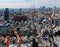 Beautiful urban skyline of Tokyo City under blue sunny sky, with Tokyo Tower standing tall among crowded high-rise skyscrapers