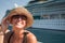 Beautiful Vacationing Woman with Cruise Ship