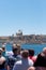 Beautiful Valletta skyline under blue sky, Valletta to Sliema Ferry, viewed from Manoel Island across Marsamxett Harbour