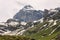 Beautiful valley in the way to Rifugio Benevolo with Granta Parey Peak at background, Val d`Aosta, Italy