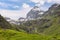 Beautiful valley in the way to Rifugio Benevolo with Granta Parey Peak at background, Val d`Aosta, Italy