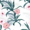 Beautiful vector floral seamless pattern background with agave, palm leaves and exotic hibiscus flowers.