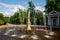 Beautiful veiw on fountain Eva in the famous park of Peterhof at summer day. Scenic architectural landscape