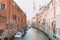 Beautiful Venice narrow canals, with many classic gondolas