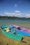 Beautiful vertical shot of the dinghy boats parked near the Montebello lake in Chiapas, Mexico