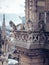 Beautiful vertical shot of the gargoyles on top of the Notre Dame Cathedral