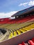 Beautiful vertical shot of the Hrazdan Stadium colorful seats in Yerevan, Armenia