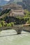 Beautiful vertical view of the Forte di Bard and the Dora Baltea river, Aosta Valley, Italy