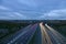 Beautiful very long exposure evening view of light trails of vehicles on motorway M50 Dublin, Ireland