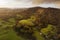 Beautiful vibrant aerial drone landscape image of sunrise in Autumn Fall over English countryside