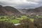 Beautiful vibrant Autumn landscape image towards Borrowdale Valley from Castle Crag in Lake Disrtrict