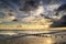 Beautiful vibrant seascape at sunset image with dramatic sky and