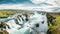 Beautiful vibrant summer panorama picture with a view on icelandic waterfall. Generative Ai