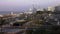 Beautiful view of Abu Dhabi city skyline and famous towers on the corniche street at sunset