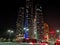 Beautiful view of Abu Dhabi towers and streets at night - Etihad Towers